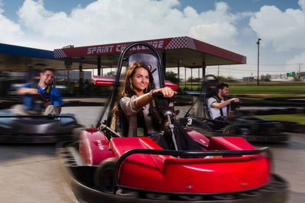 Austin Rivel commercial photo friends on race cart track 
