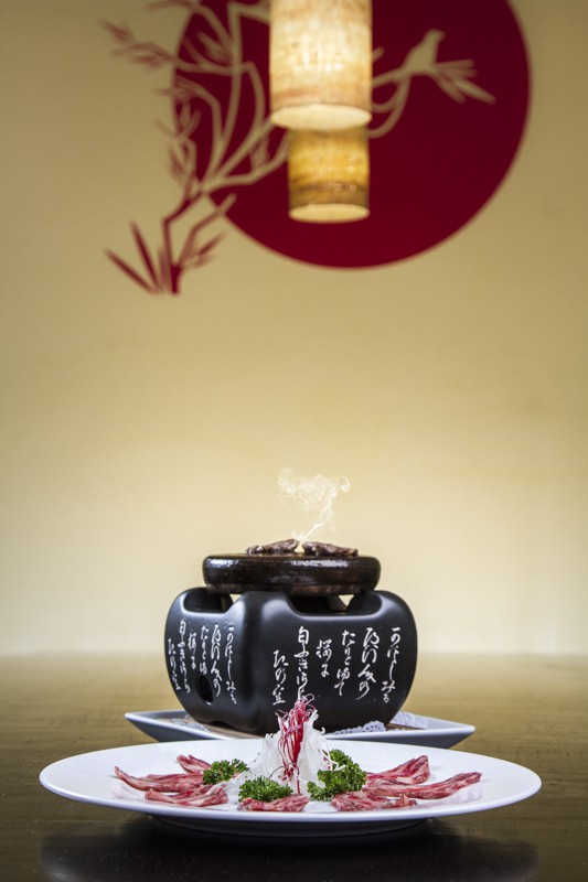 Kobe beef cooked on hot stone