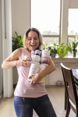 Austin brand photo of woman with armful of products