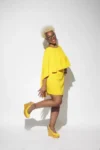 Austin Black woman in yellow dress studio branding photo