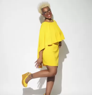 Austin Black woman in yellow dress studio branding photo