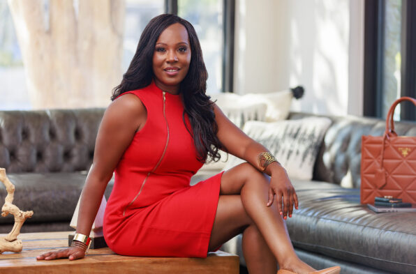 hair stylist in salon with coffee mug