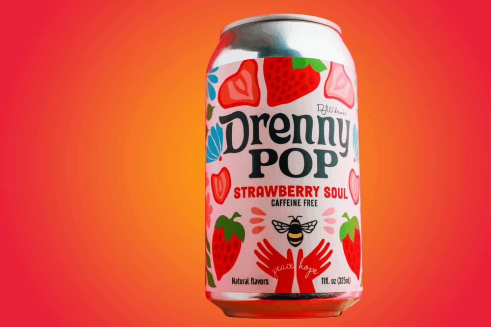 Can of Drenny Pop strawberry soul caffeine-free soda photographed against an orange gradient background