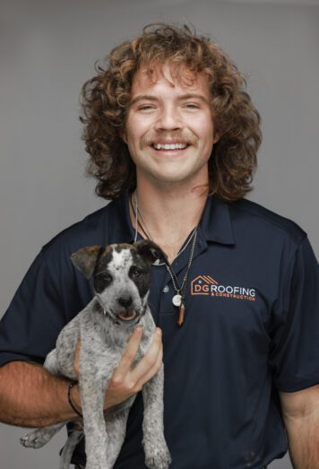 fun headshot with man and puppy