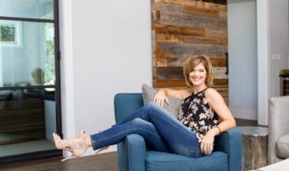 Austin professional organizer photographed in a blue chair for her brand session